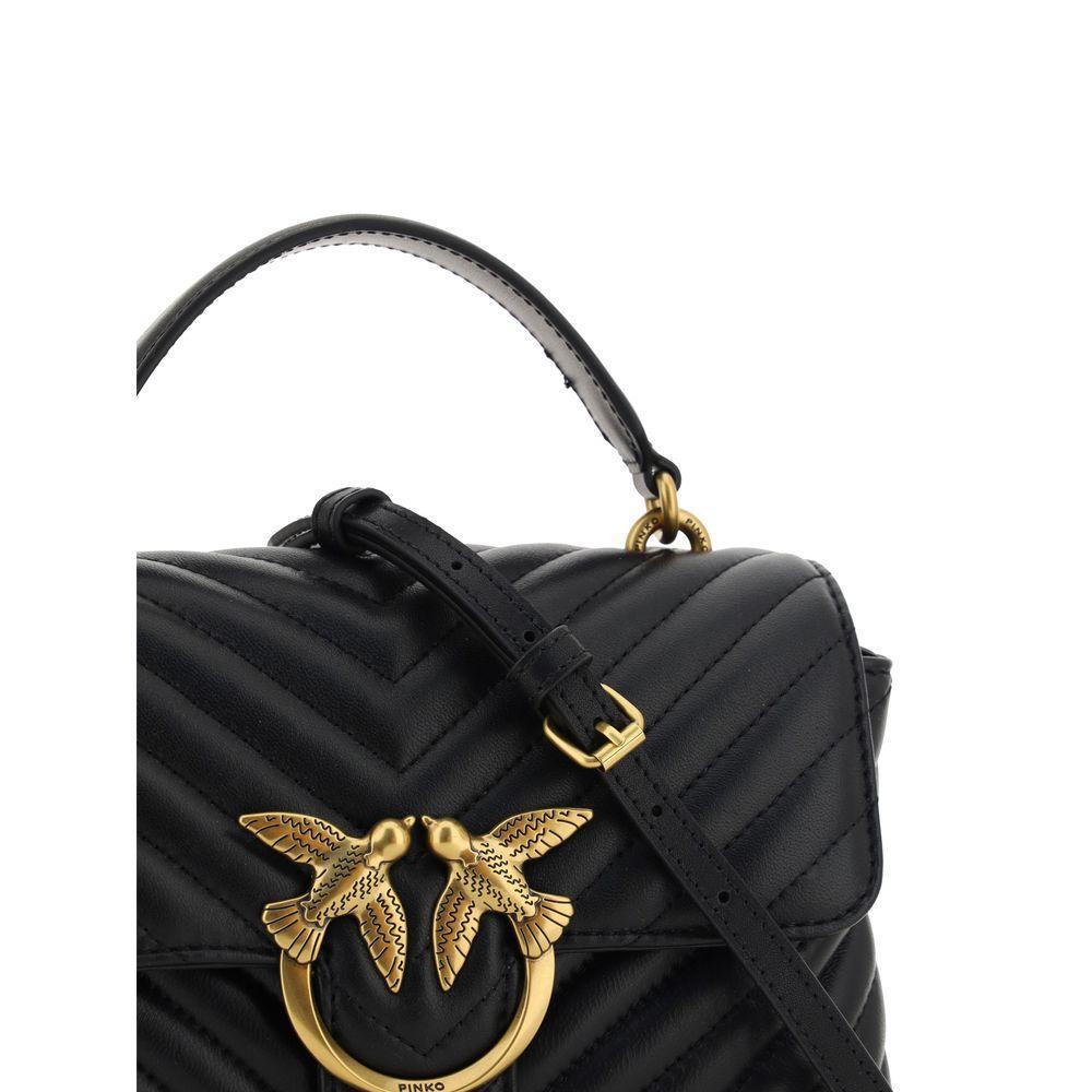 Front view with bag zipped and handles upright.