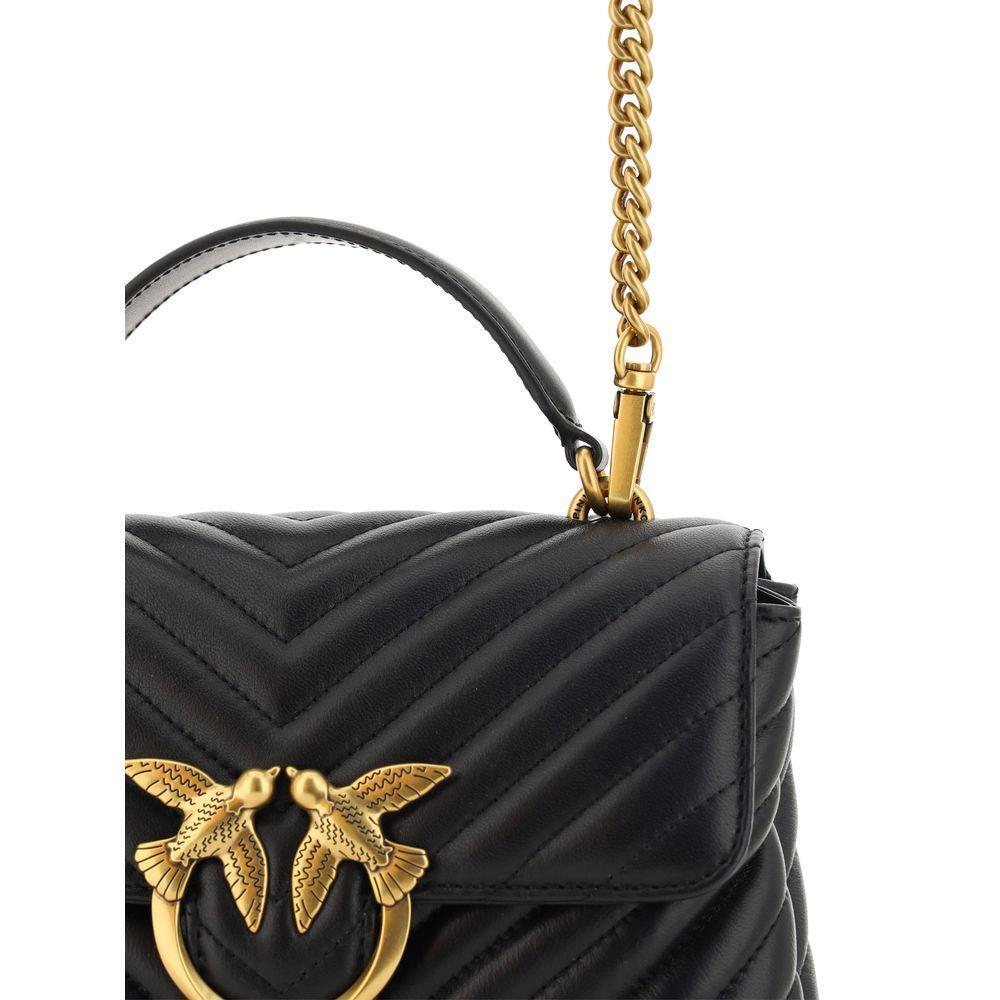 Front view with bag zipped and handles upright.