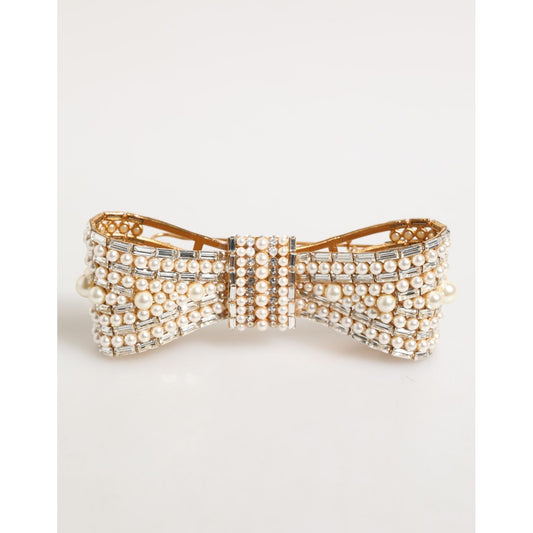 Dolce & Gabbana Gold Brass Glas Crystal Faux Pearl Embellished Brooch with bow design, featuring shimmering crystals and pearls.