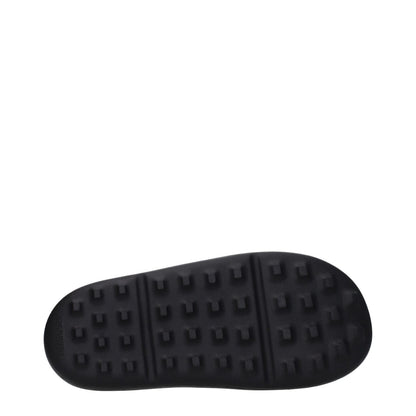 Sole of Ambush Black Cotton Slippers showcasing rubber shoe sole and open toe design.
