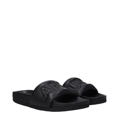 Ambush Black Leather Slippers with open toe and front logo, featuring rubber sole. Style: Street. MPN: BMIC001LEA0011000