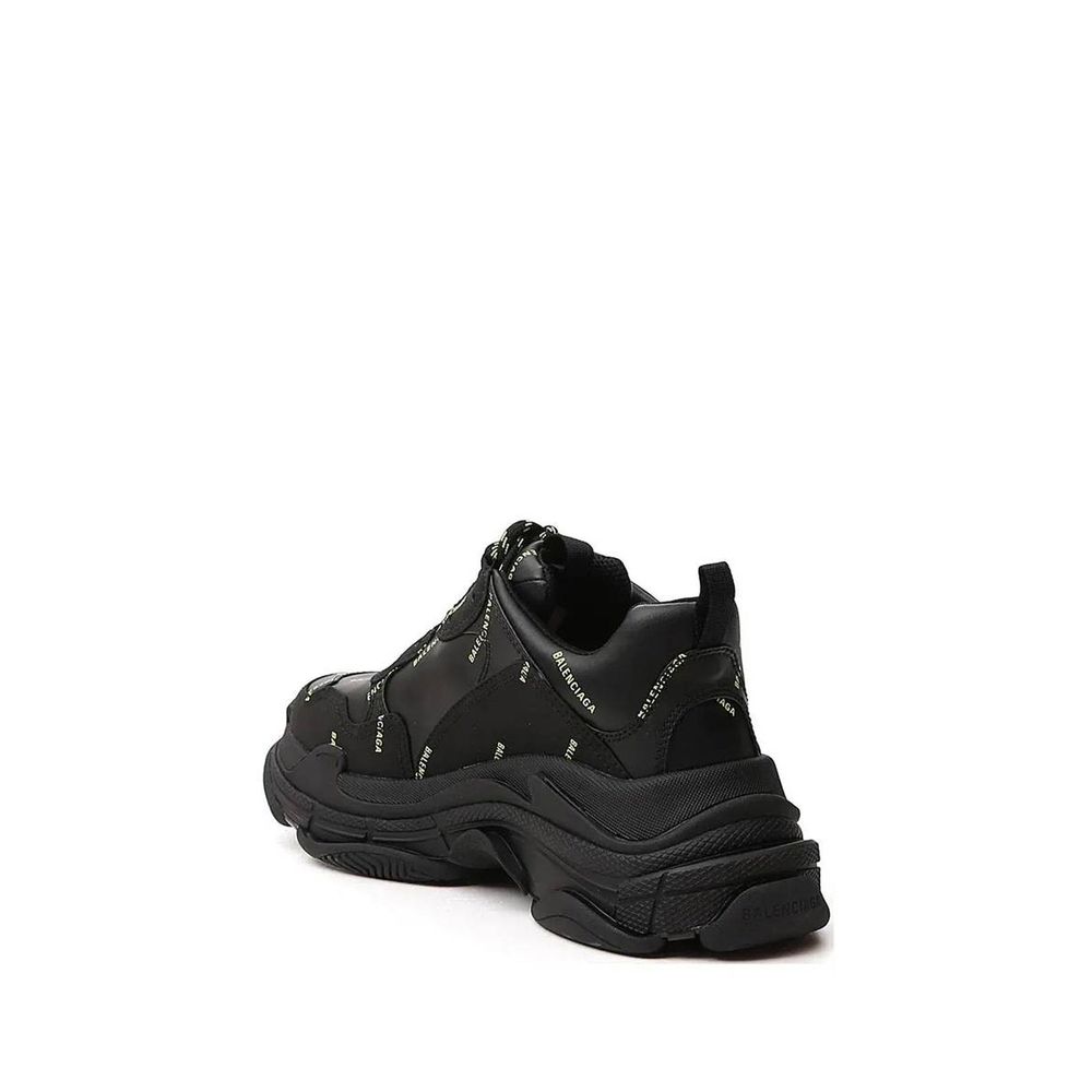 Balenciaga Black Calfskin Chunky Sneakers with logo detail, featuring a round toe and rubber sole, made for men.