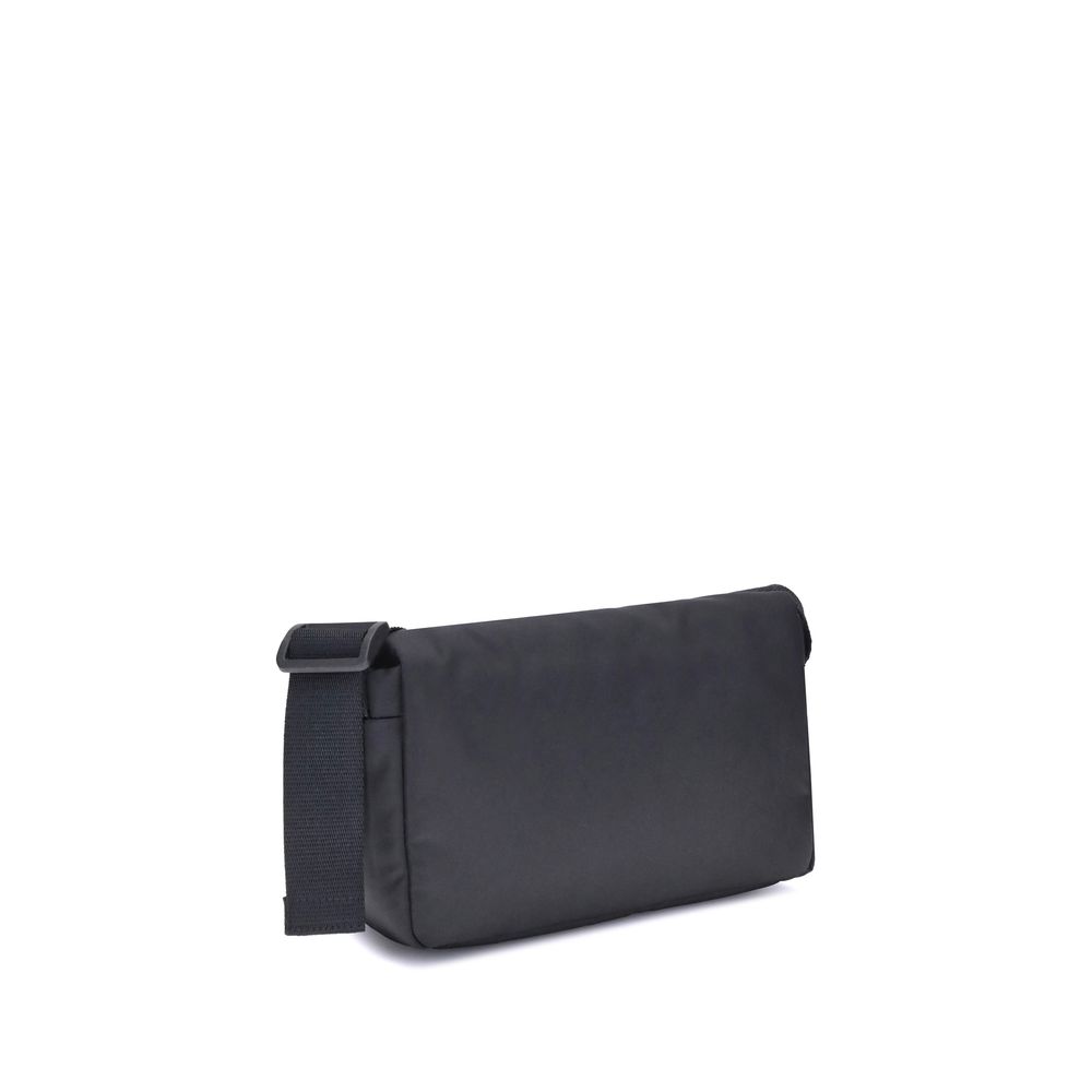Balenciaga Black Polyamide Shoulder Bag with minimalist design and adjustable strap, shown from the back view displaying its sleek nylon texture.
