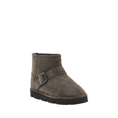 Brunello Cucinelli Brown Calf Leather Bos Taurus Ankle Boots with adjustable buckle and knurled sole, elegant and practical for winter.