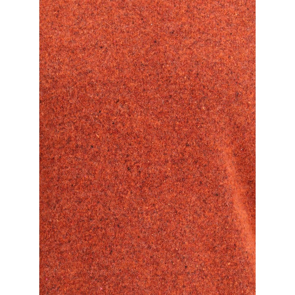 Close-up texture of Brunello Cucinelli Orange Alpaca Vicugna Pacos Sweatshirt showing mélange pattern and rich color.
