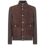 Brunello Cucinelli Suede and cashmere blouson jacket with brown leather, cashmere collar, cuffed sleeves, button pockets, and ribbed hem.
