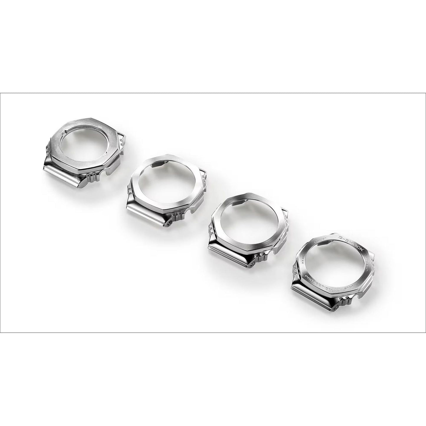 Set of watch bezels in silver for CASIO MOD. GM-2110D-2AER displayed in a row.