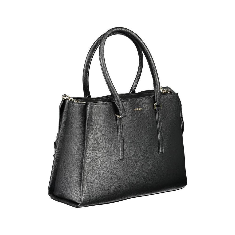 Front view with bag zipped and handles upright.