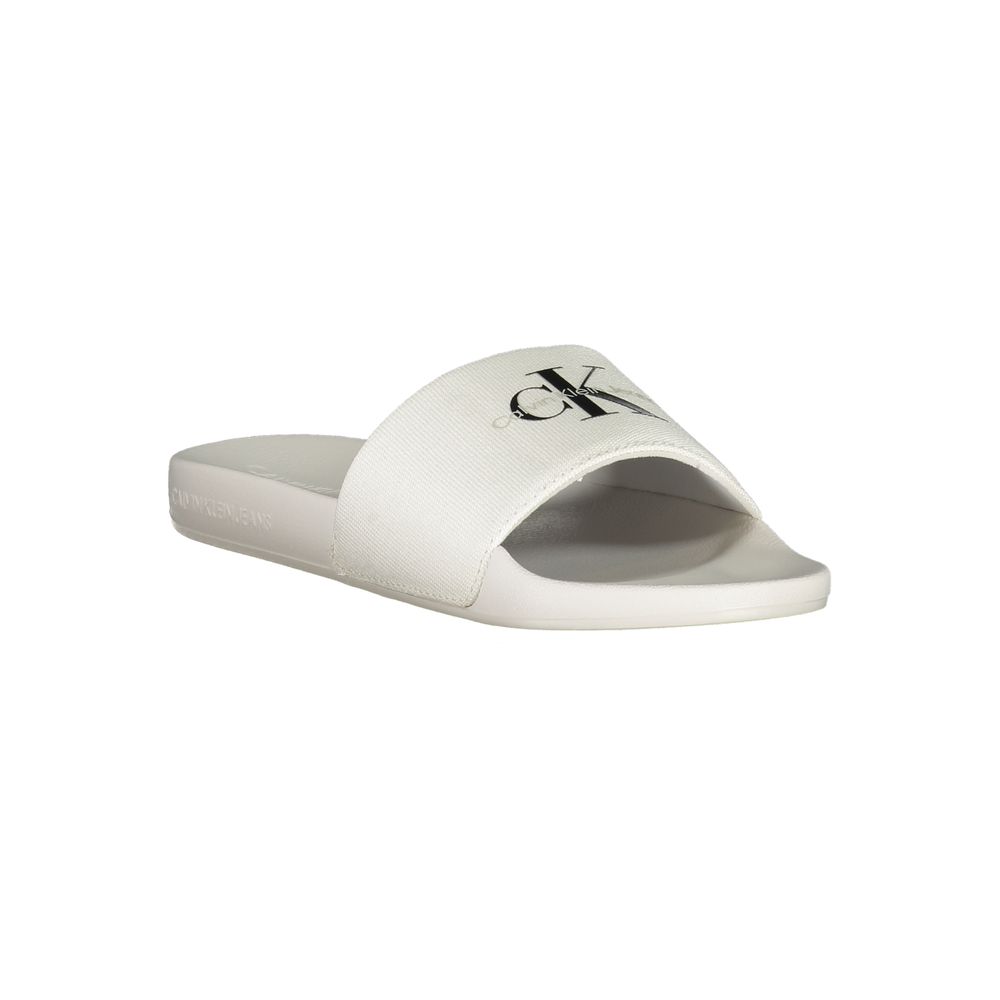 Calvin Klein White Polyester Women Sandal with logo print, perfect for poolside elegance or city strolls, showcasing contemporary chic style.