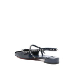 Christian Louboutin Sweet Janispikes Ballerinas in blue patent leather with studded embellishment and slingback strap, side view.