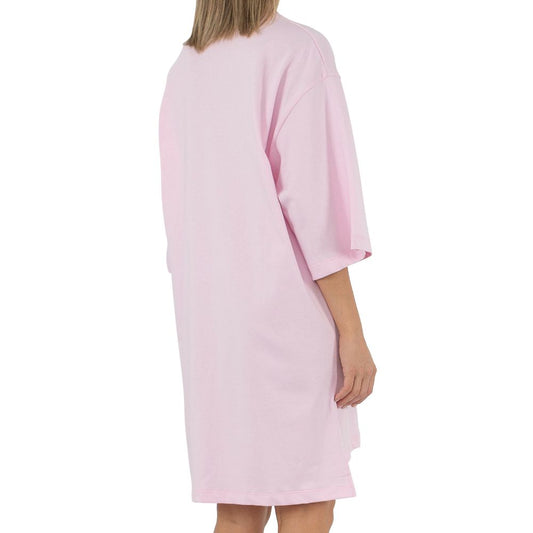 Back view of Comme Des Fuckdown Pink Cotton Dress, oversized t-shirt style with logo print, perfect for casual wear.