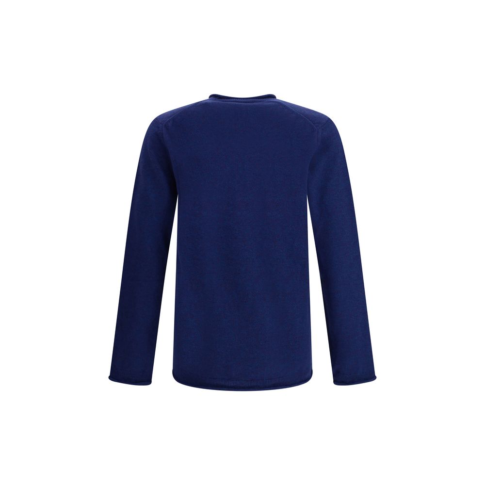 Comme Des Garçons Blue Wool Sweatshirt, ribbed knit texture, long sleeve, round neckline, contemporary design for everyday elegance.