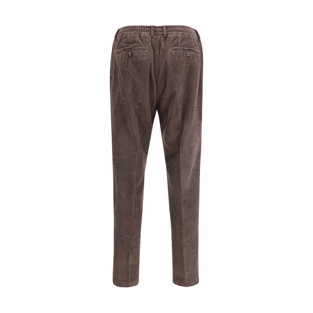 Back view of Cruna Brown Cotton Casual Pants in corduroy with belt loops, showcasing elegant slim fit ideal for autumn and winter seasons.
