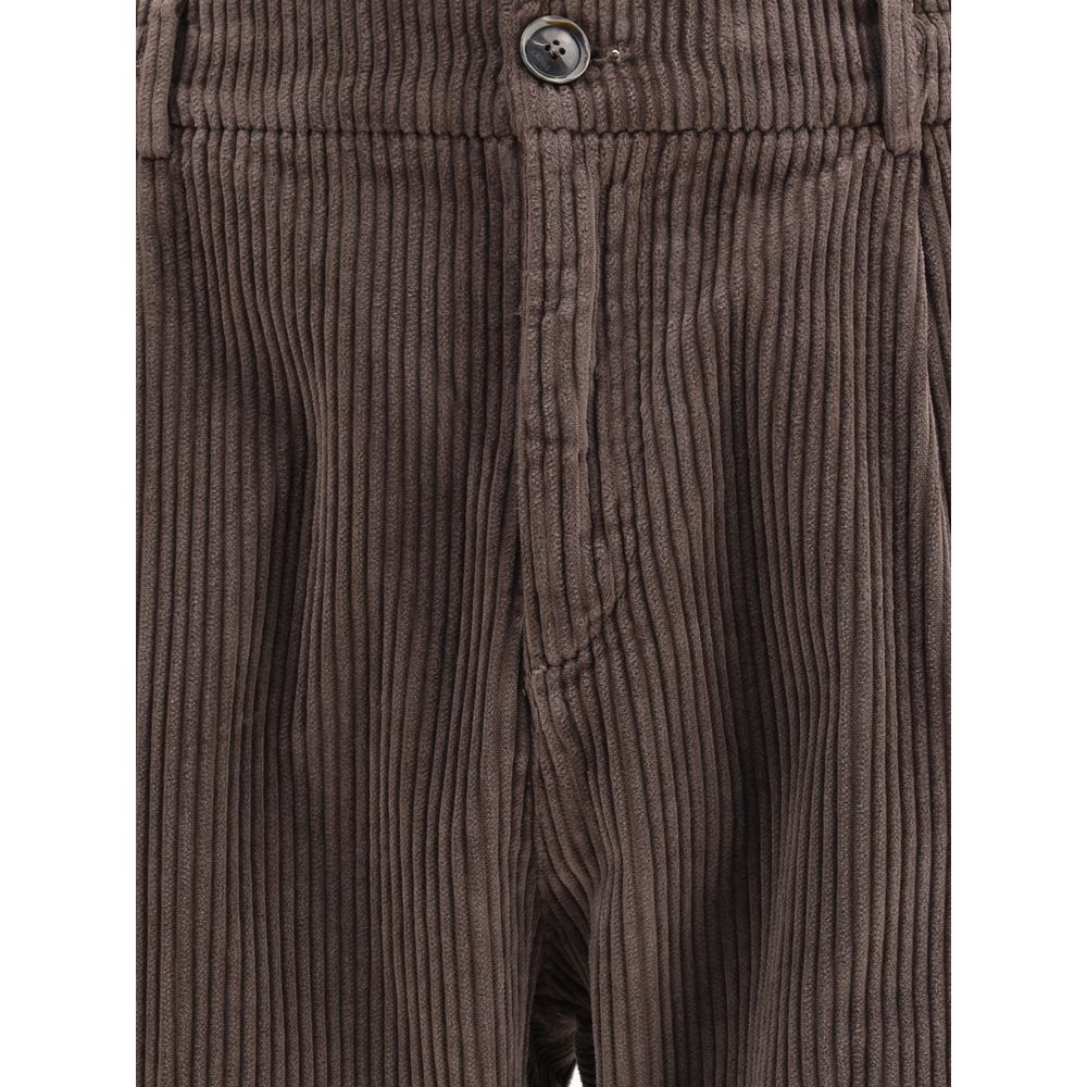 Cruna Brown Cotton Casual Pants with corduroy texture and slim fit design, featuring a zip-and-button closure, ideal for autumn wear.