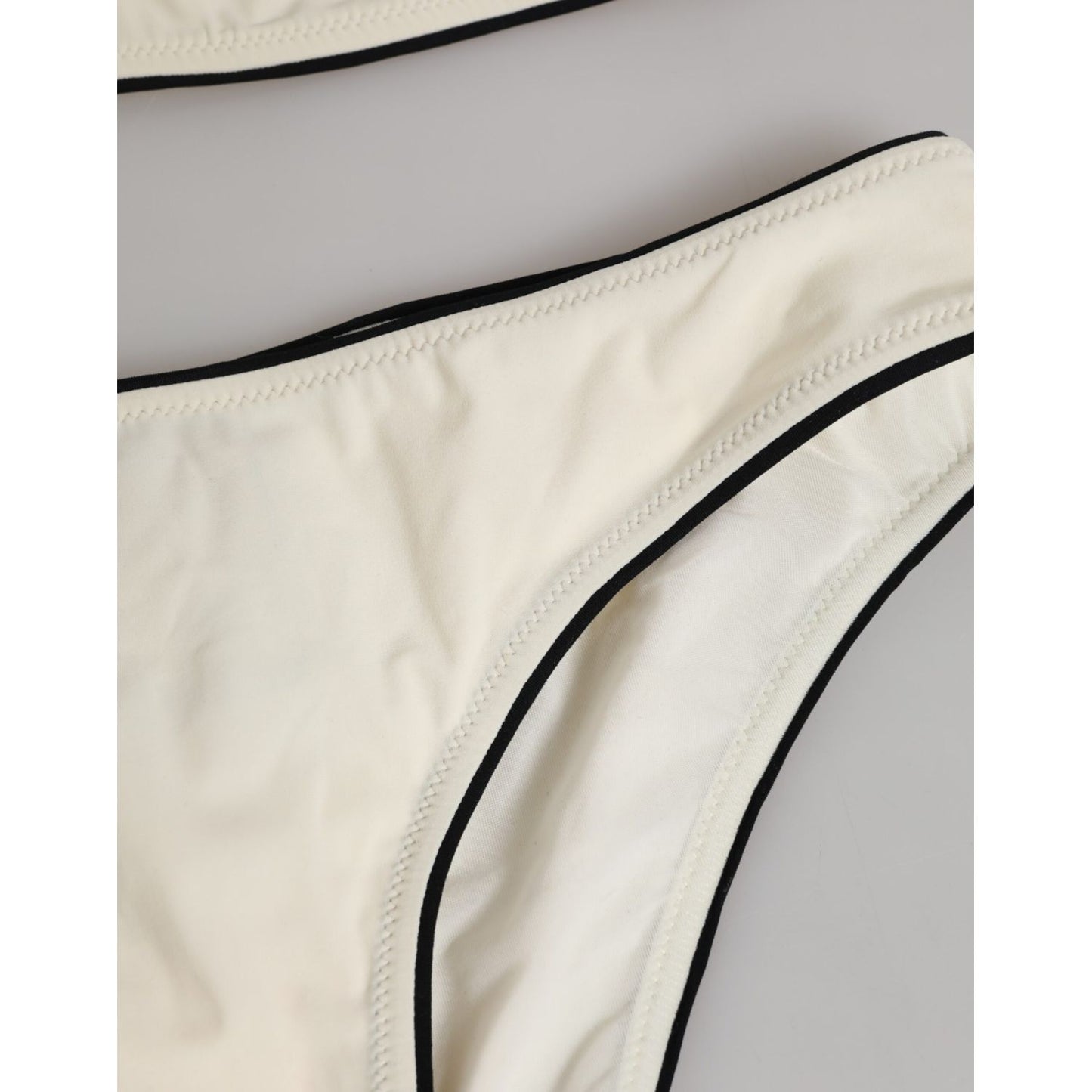 Close-up of Dolce & Gabbana Beige Logo Swimsuit 2 Piece Top Bottom Swimwear, showcasing luxurious fabric and sleek design details.