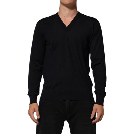 Dolce & Gabbana Black Cashmere Knit V-Neck Pullover Sweater featuring a classic design worn by a model, highlighting luxury and elegance.