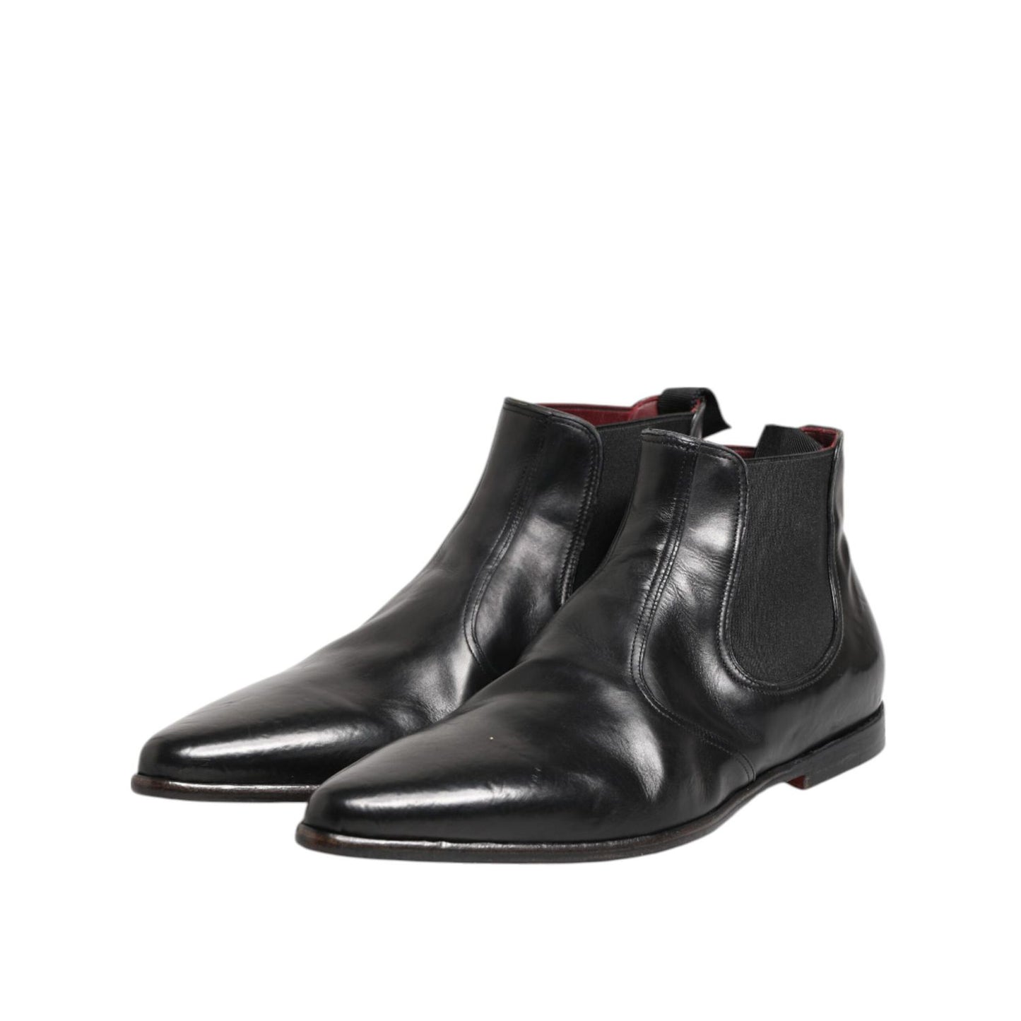 Dolce & Gabbana Black Chelsea Slip On Men Ankle Boots Shoes in calf leather with logo details and stretch bands, angled view.