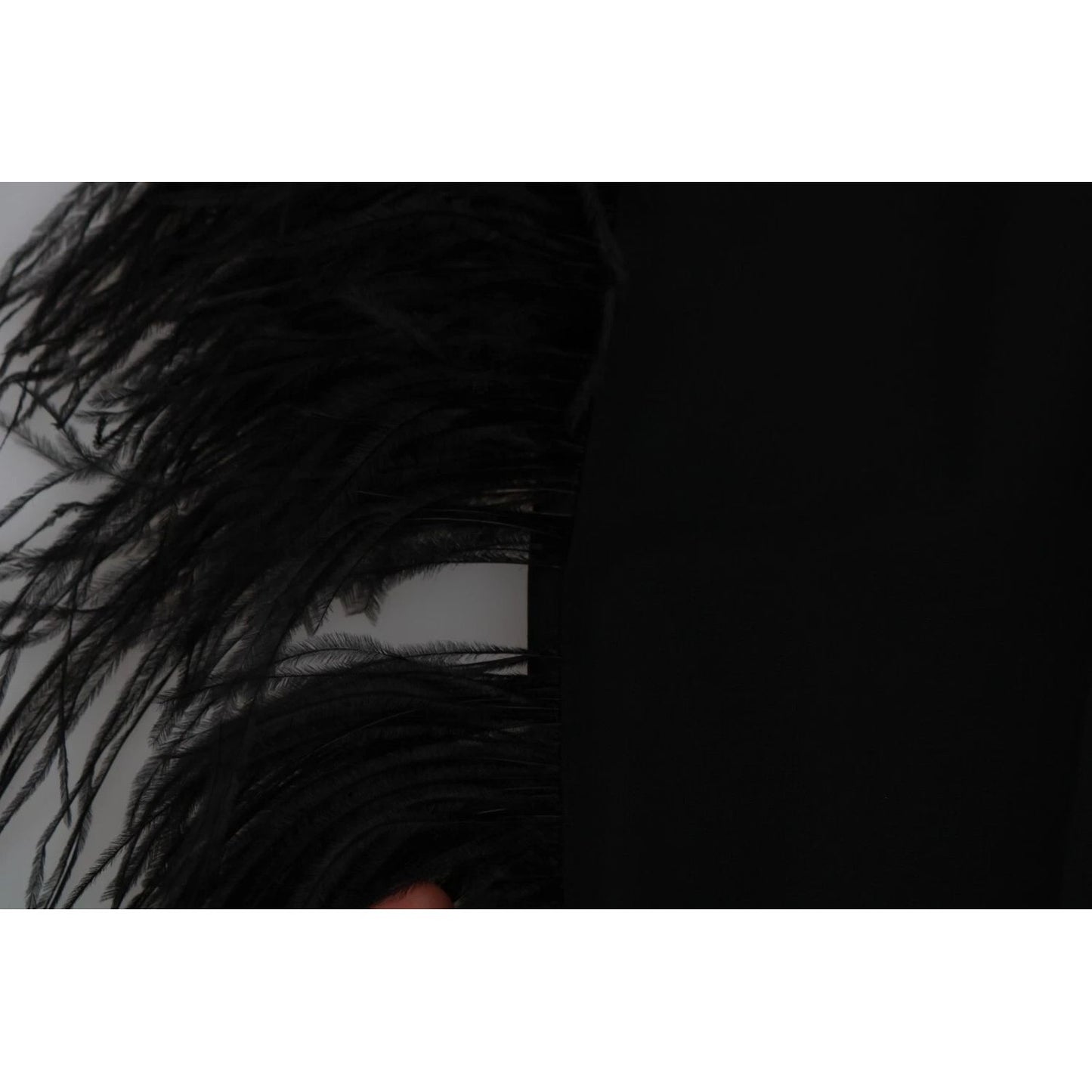 Close-up of missing feather detail on Dolce & Gabbana Black Feather Straight High Waist Pants.