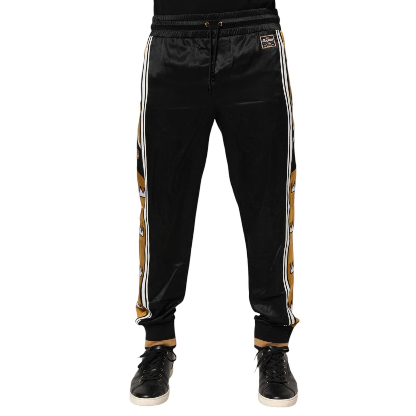 Dolce & Gabbana Black Gold Satin Crown Side Stripe Jogger Pants with ribbed cuffs and elastic waistband.