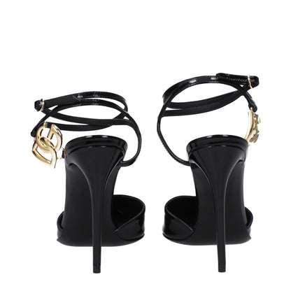 Dolce & Gabbana Black Leather Stiletto Heel Sandals with gold logo and buckle closure, stylish high heel design, rear view.