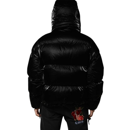 Back view of a Dolce & Gabbana Black Logo Full Zip Hooded Quilted Jacket made from 100% nylon, featuring a zipper closure and logo details.