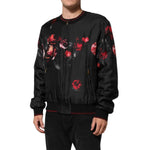 Dolce & Gabbana Black Red Floral Silk Bomber Blouson Jacket with zip closure and ribbed details, worn by model.