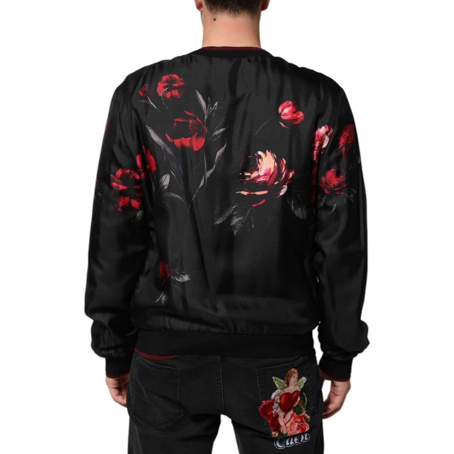 Back view of Dolce & Gabbana Black Red Floral Silk Bomber Blouson Jacket with elegant silk fabric and red floral print.