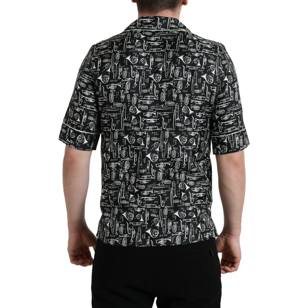 Back view of a Dolce & Gabbana Black Silk Pattern Shirt in regular fit, showcasing intricate designs.