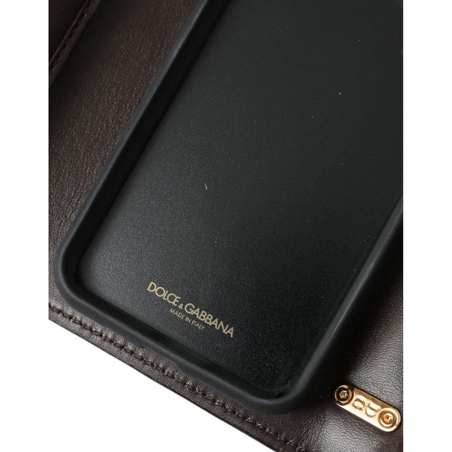 Close-up of Dolce & Gabbana Brown Python Leather DG Girls Crossbody Phone Bag interior, showcasing the branded leather lining.