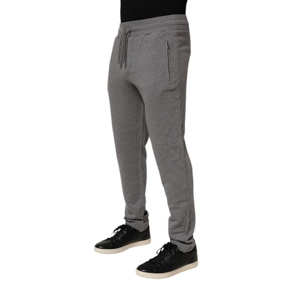 Dolce & Gabbana Cotton Jogger Sweatpants Trouser Gray with elastic waistband and drawstring, shown on model, front view.