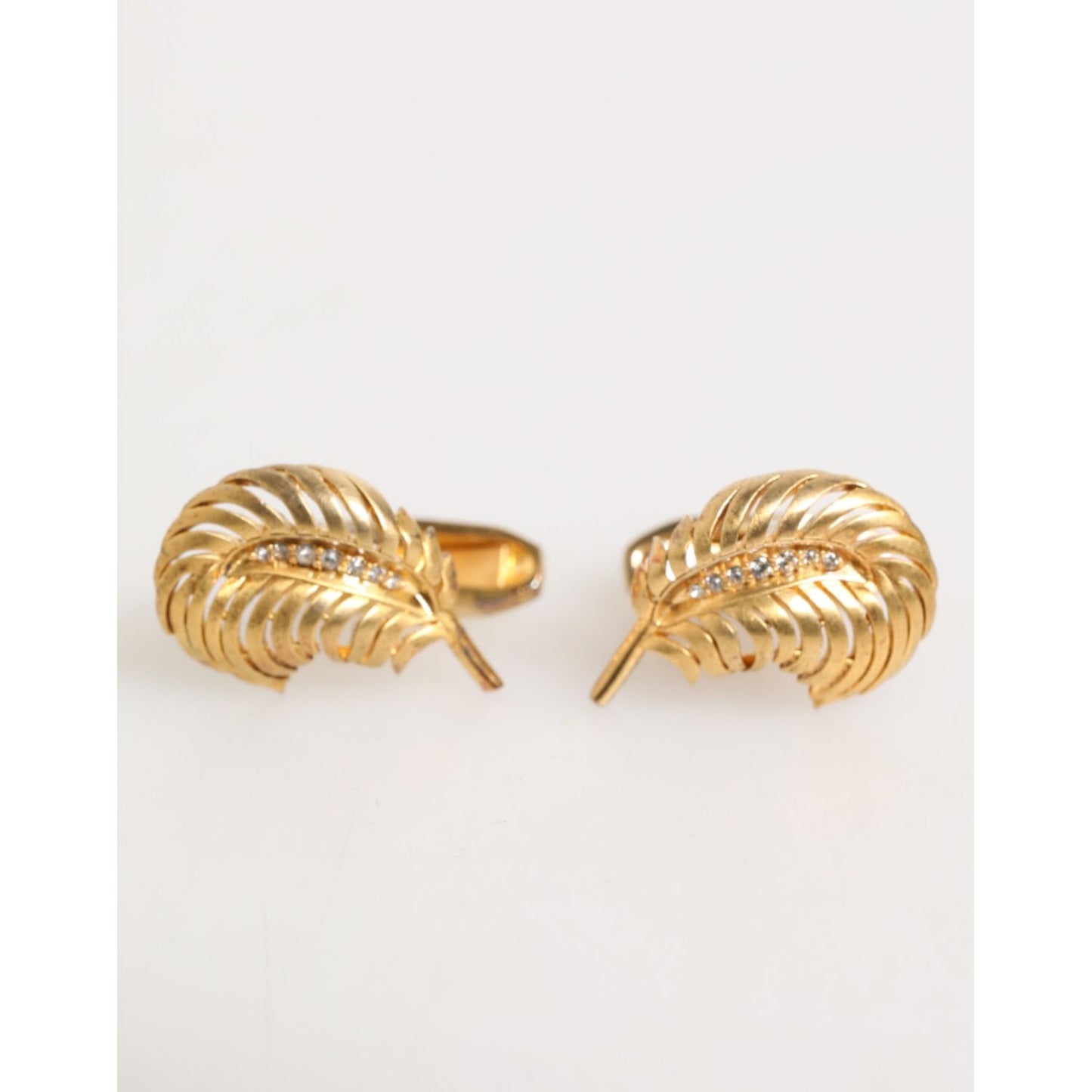 Dolce & Gabbana Gold 925 Sterling Silver Crystal Leaf Accessory Cufflink with elegant design and sparkling crystals.
