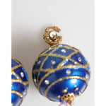 Dolce & Gabbana Gold Brass Blue Christmas Ball Crystal Drop Clip On Earrings with sparkling gold details and teardrop crystals.