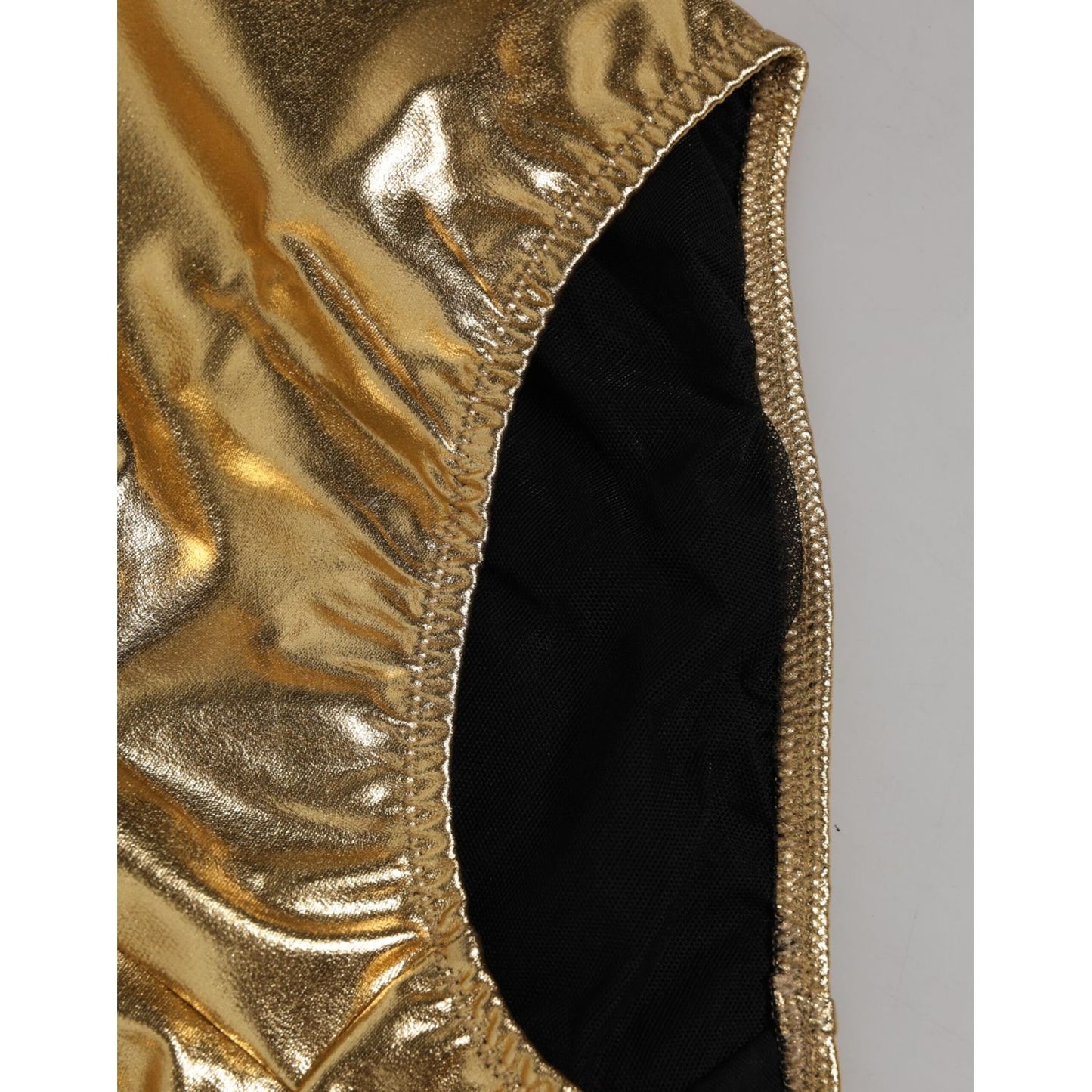 Close-up of Dolce & Gabbana Gold Silk High Waist Girdle Panty Underwear detailing.