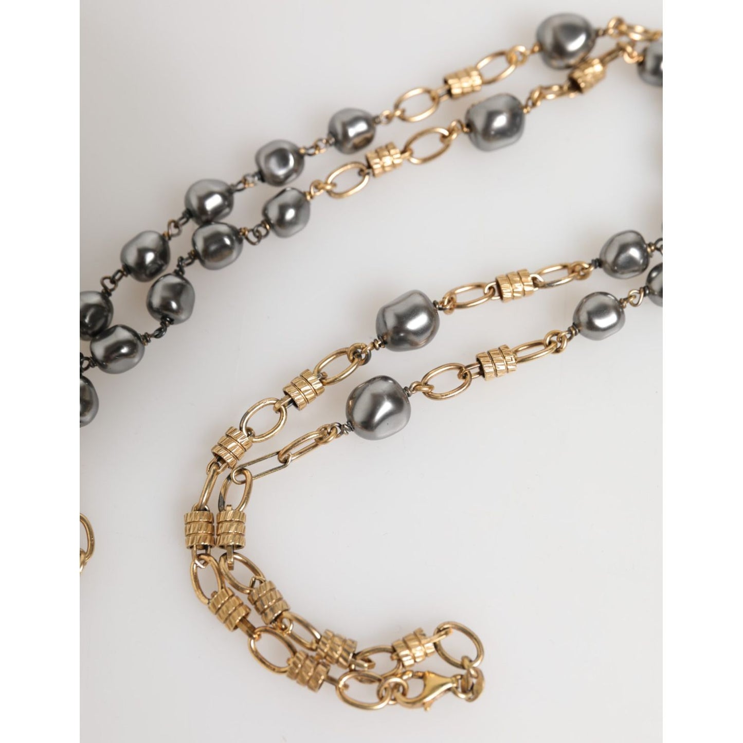 Dolce & Gabbana Gold Tone Beaded Chain Religious Cross Necklace with silver beads, showcasing intricate lobster clasp and luxurious design.