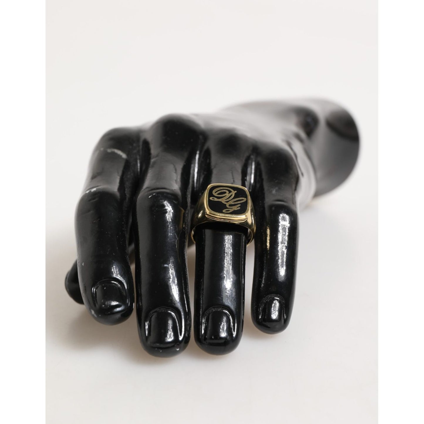 Dolce & Gabbana Gold Tone Enamel Brass Signet DG Logo Adjustable Ring on mannequin hand