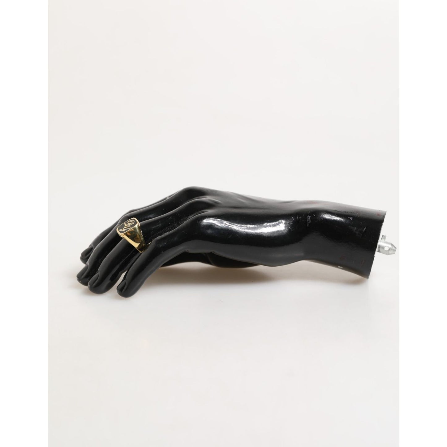 Dolce & Gabbana Gold Tone Enamel Brass Signet DG Logo Adjustable Ring on display
