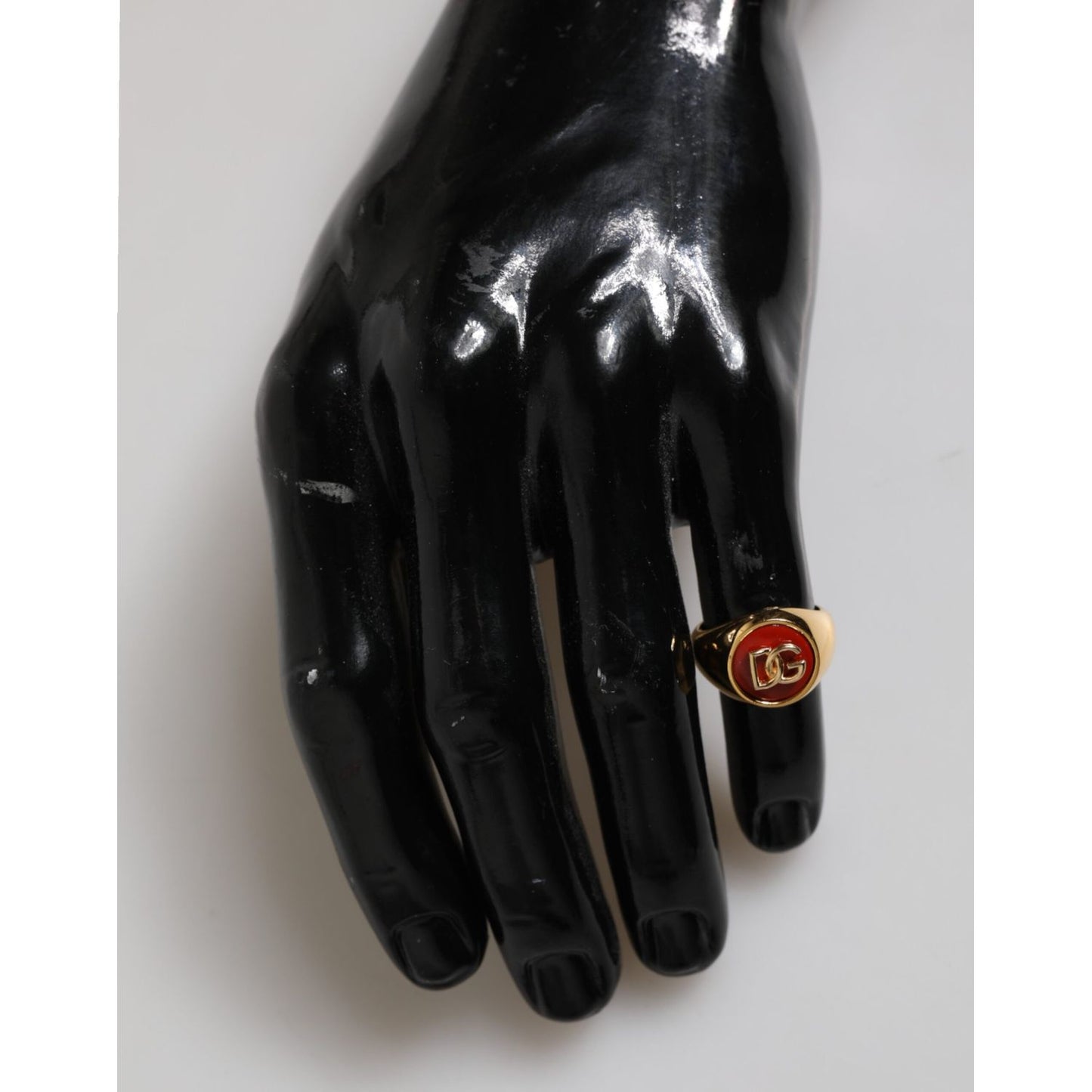 Dolce & Gabbana Gold Tone Real Brass Round Red DG Logo Men Ring on black mannequin hand