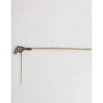 Dolce & Gabbana Lapel Pin Brass Copper Revolver Men Accessories Brooch in aged gold-tone finish on white background.
