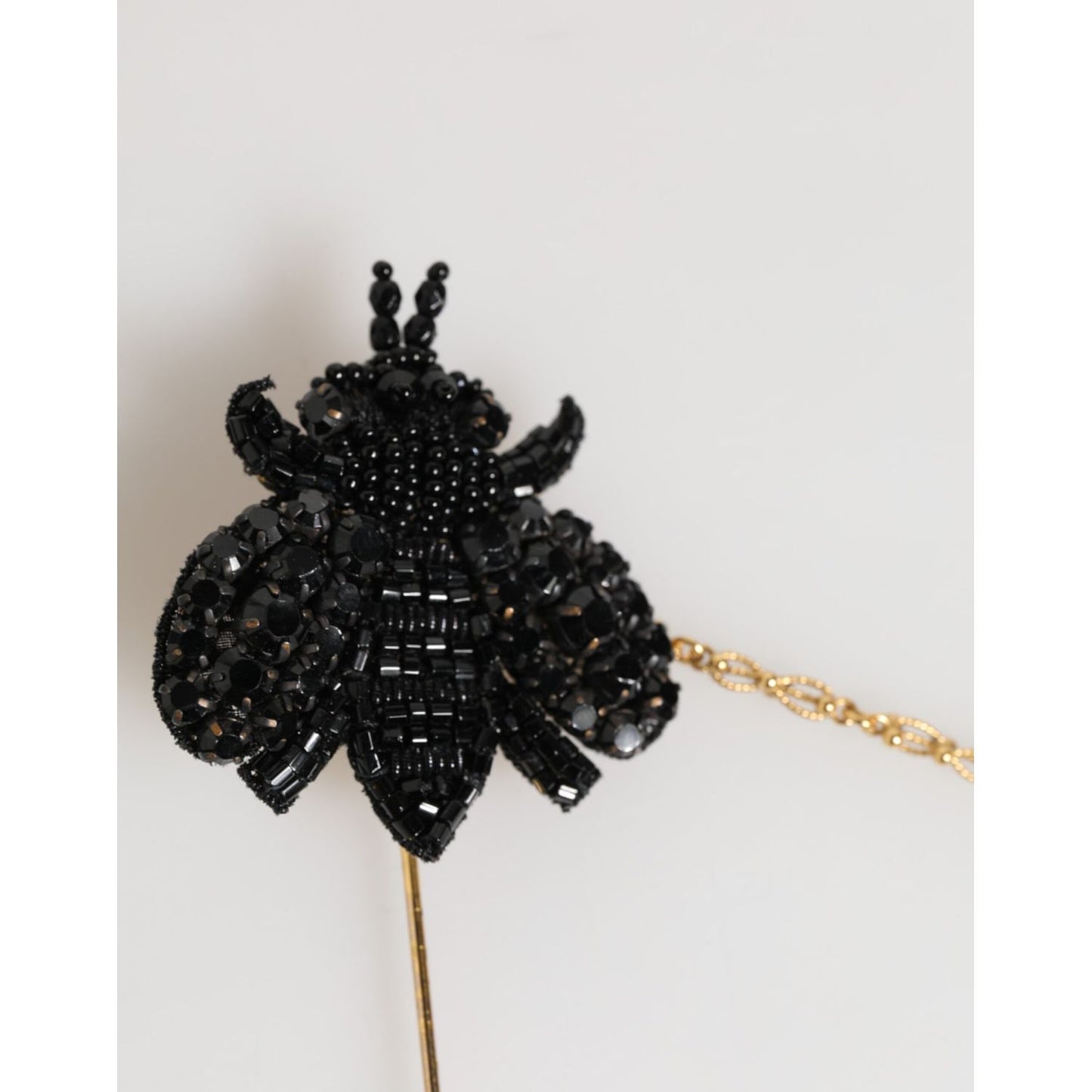 Dolce & Gabbana Lapel Pin Gold Brass Black Crystal Bee Accessories Brooch showcasing intricate design and luxury craftsmanship.