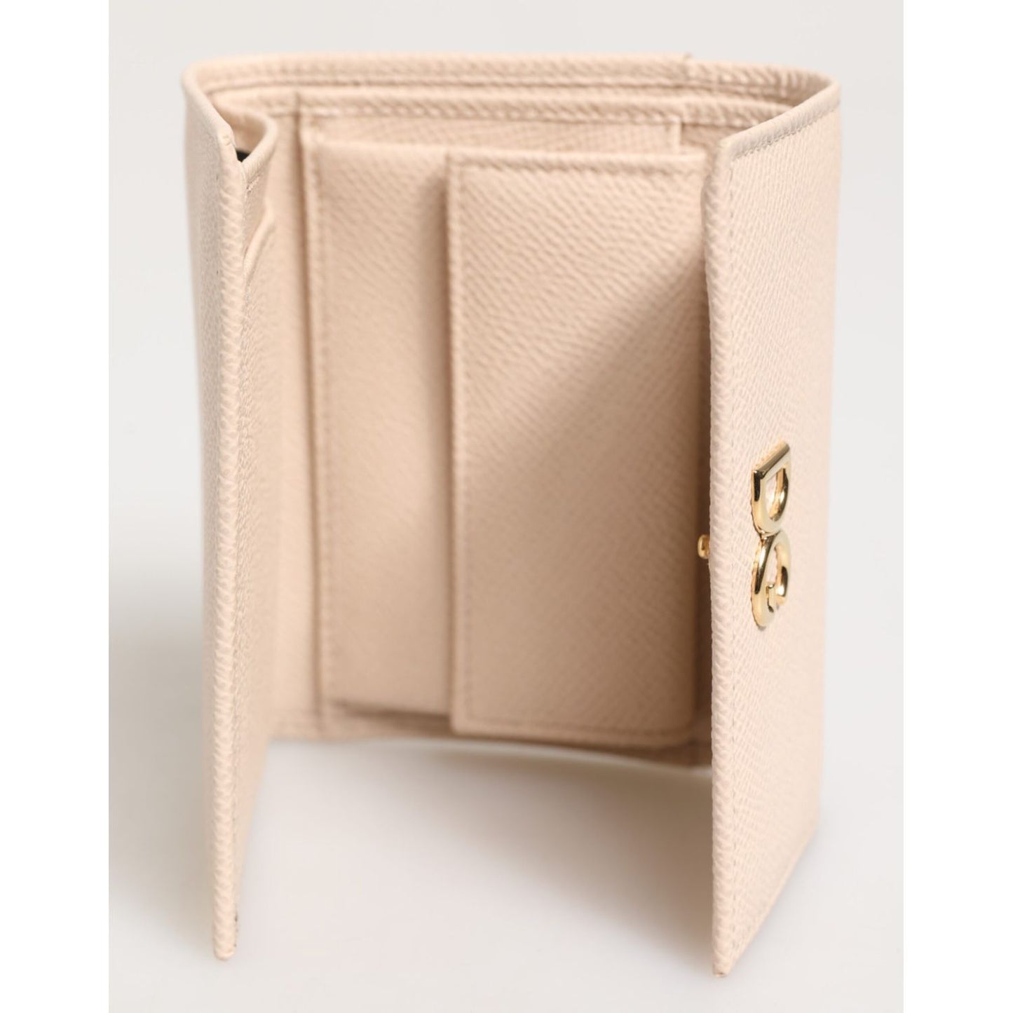 Dolce & Gabbana Light Pink Calf Leather DG Logo French Flap Wallet open view with gold-tone logo and compartments