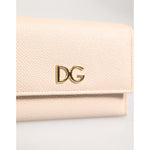 Dolce & Gabbana Light Pink Calf Leather DG Logo French Flap Wallet in elegant design with gold-tone logo emblem.