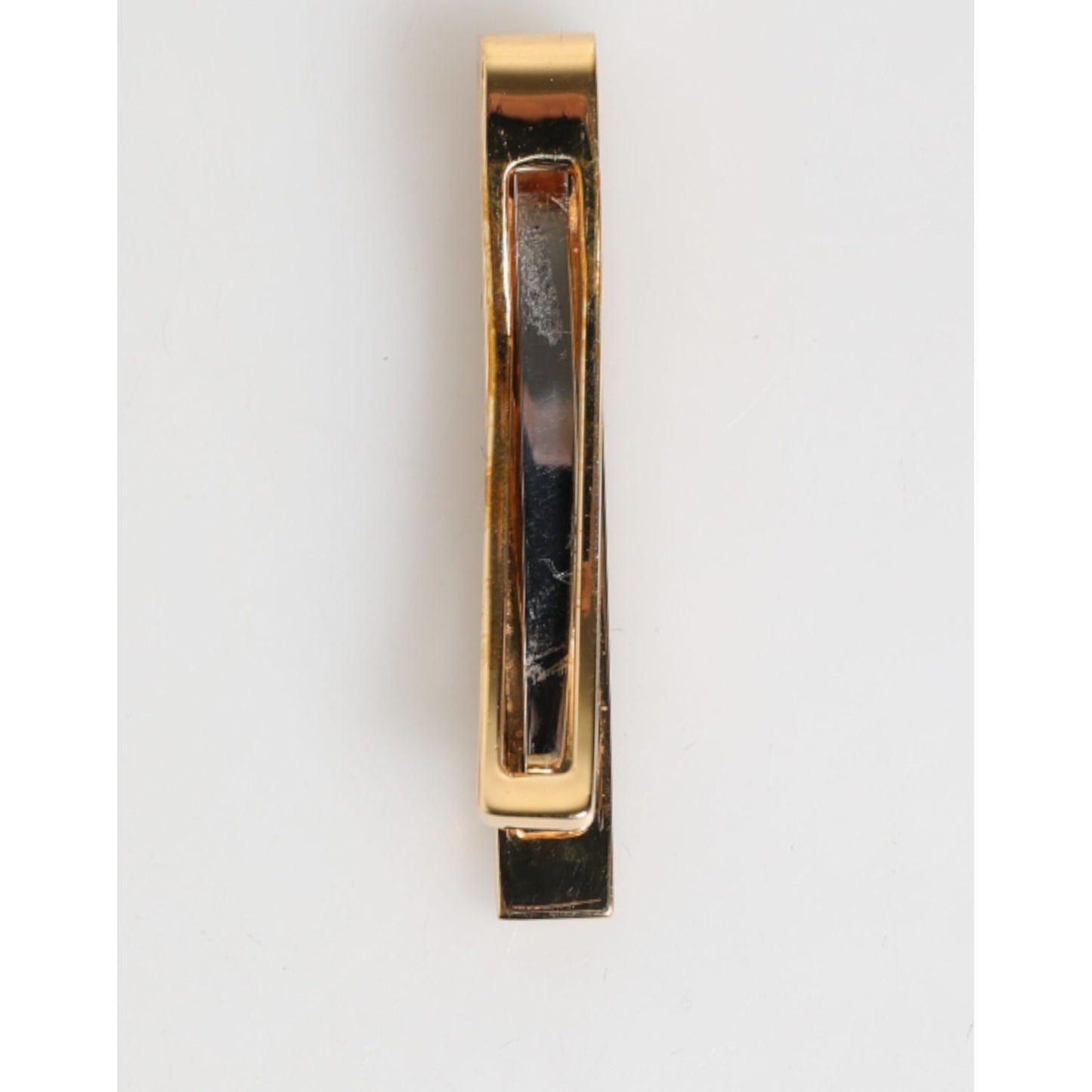Dolce & Gabbana Multicolor Gold Tone Brass Men's Accessory Tie Clip Bar with polished finish, enhancing formalwear appeal.