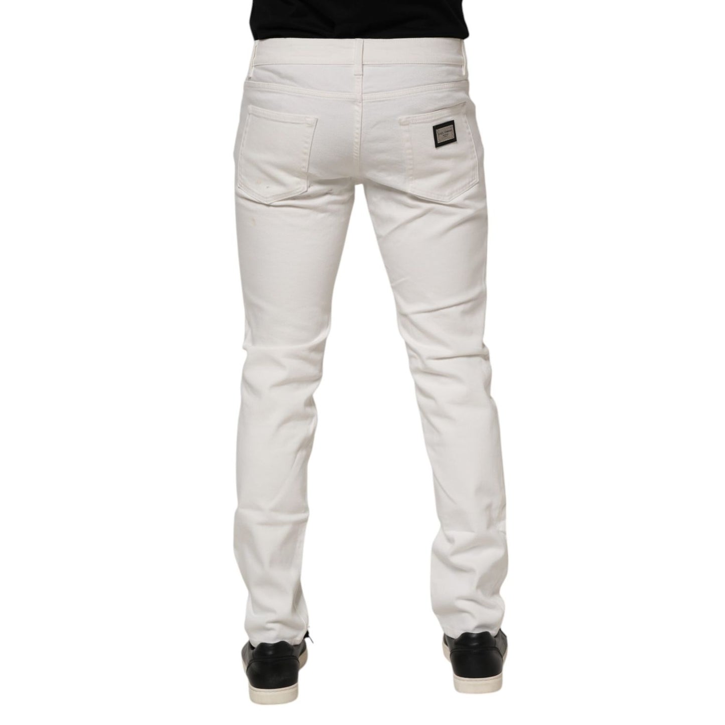 Back view of Dolce & Gabbana Off White Cotton Stretch Slim Fit Denim Jeans showcasing the sleek slim silhouette and classic design.