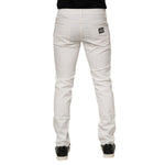 Back view of Dolce & Gabbana Off White Cotton Stretch Slim Fit Denim Jeans showcasing the sleek slim silhouette and classic design.