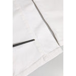 Close-up of Dolce & Gabbana Off White Cotton Stretch Slim Fit Denim Jeans fabric detail.