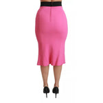 Dolce & Gabbana Pink High Waist Pencil Cut Midi Skirt with zipper closure and silk stretch lining, viewed from the back, made in Italy.