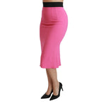 Dolce & Gabbana Pink High Waist Pencil Cut Midi Skirt with silk lining, side view on model, showcasing elegant design and vibrant color.