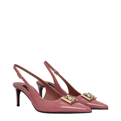 Dolce & Gabbana Pink Leather High Heel Pumps with gold front logo, pointy toe, and buckle closure. Stylish mid heels for elegant wear.