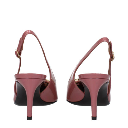 Back view of Dolce & Gabbana Pink Leather High Heel Pumps with buckle closure and mid heels, featuring pointy toe and leather sole.