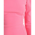 Close-up of Dolce & Gabbana Pink Polyester Long Sleeves Sheath Midi Dress fabric and stitching detail.